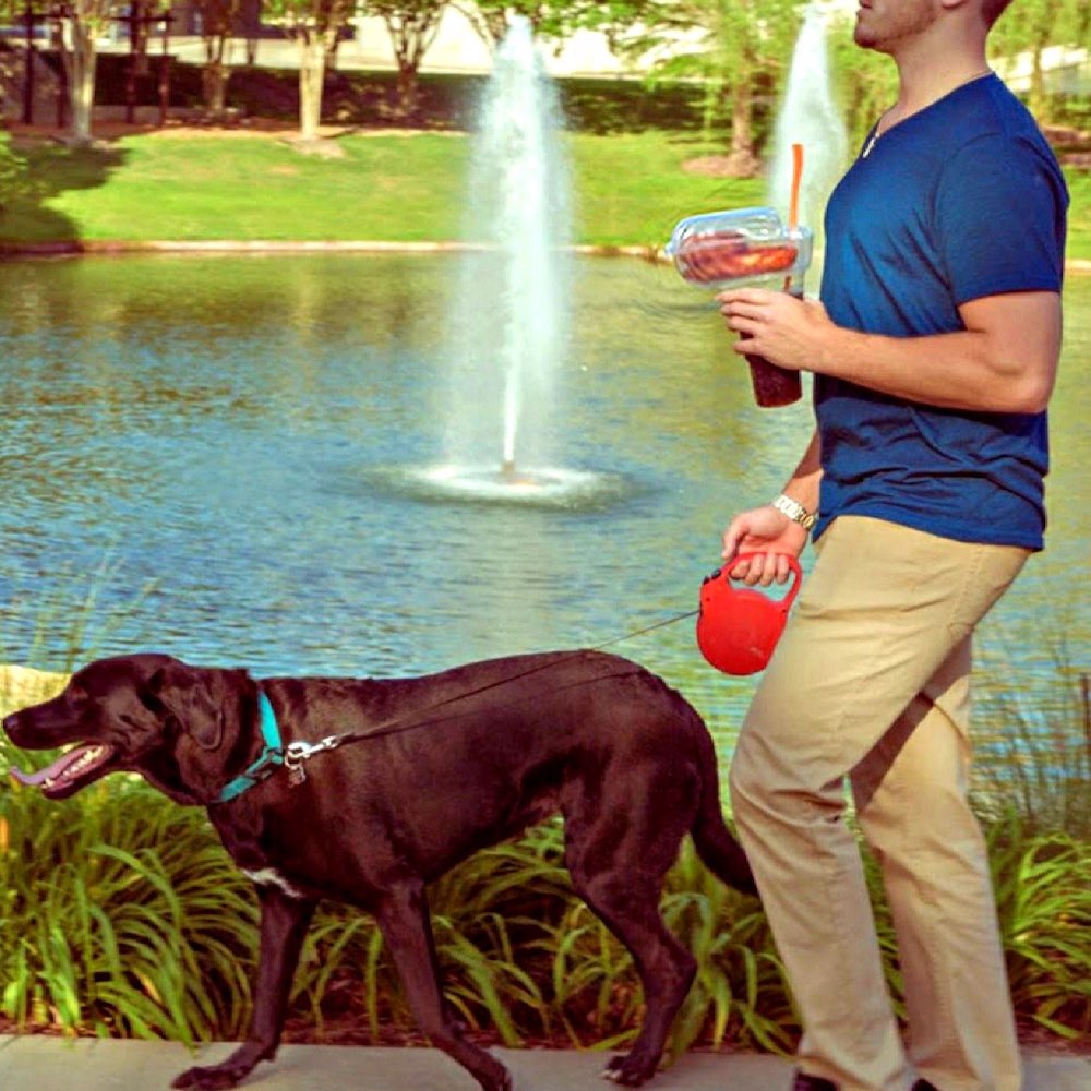 Man with GoLidZ walking dog